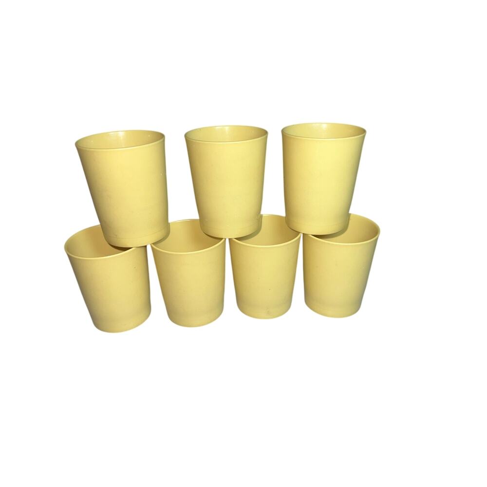 Vintage Tupperware  tumblers, specifically Harvest Gold Juice Cups set of 7